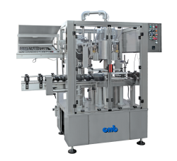Monoblock capsuling machine with 4+4 heads and mechanical needle distributor