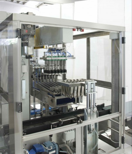 Unpacking/packing machines