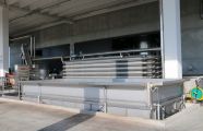 Tanks with screw conveyors