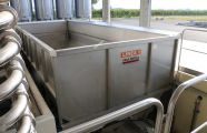 Tanks with screw conveyors