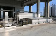Tanks with screw conveyors